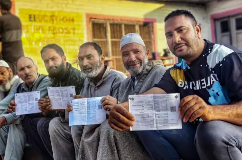 Voters wait to cast their vote for the first phase of the Jammu and Kashmir Assembly elections, in Pulwama on Wednesday. | Photo: ANI