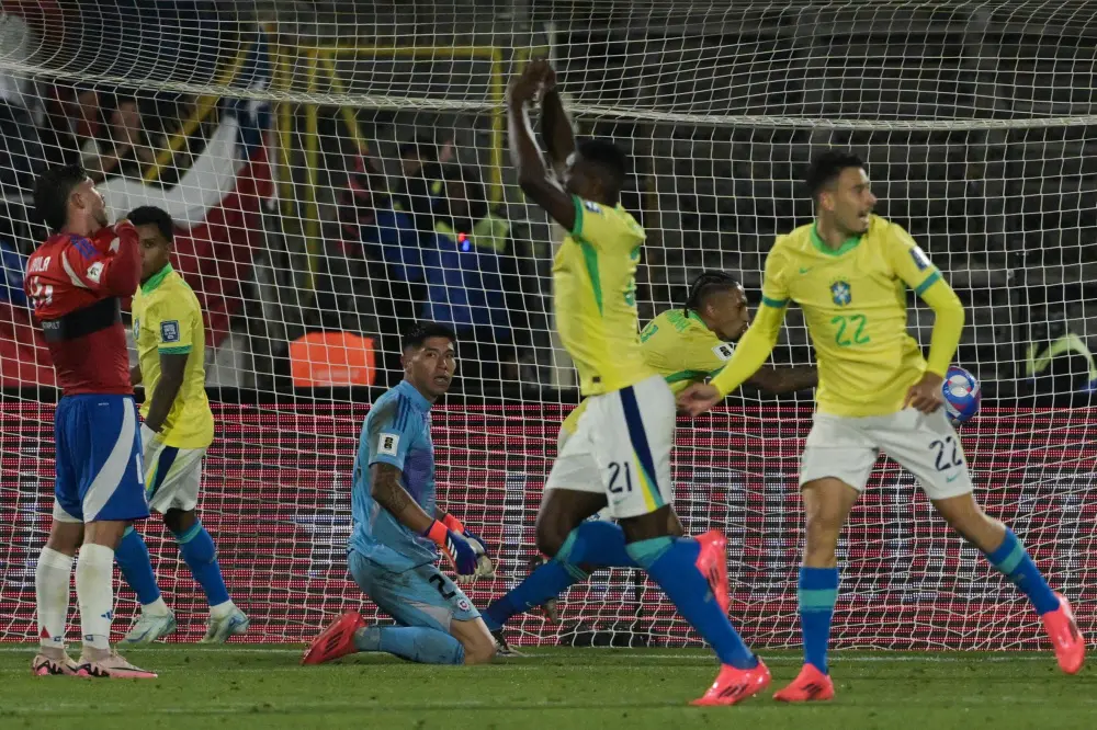 Brayan Cortes (3rd-L) looks at Brazil's forward Luiz Henrique (4th-L) celebrates after he scores his team's second goal during the 2026 FIFA World Cup South American qualifiers | AFP