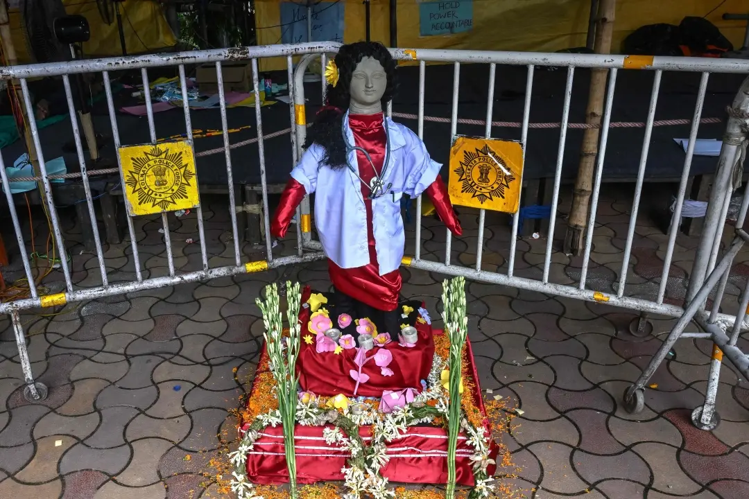 A clay statue of a doctor depicting a victim of rape and murder is pictured at a protest site during the nationwide strike by doctors, in Kolkata | Photo: AFP