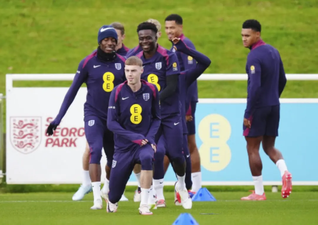 England's Noni Madueke, Cole Palmer and Bukayo Saka during a training session at St George's Park, Burton-on-Trent, England. | Photo: AP