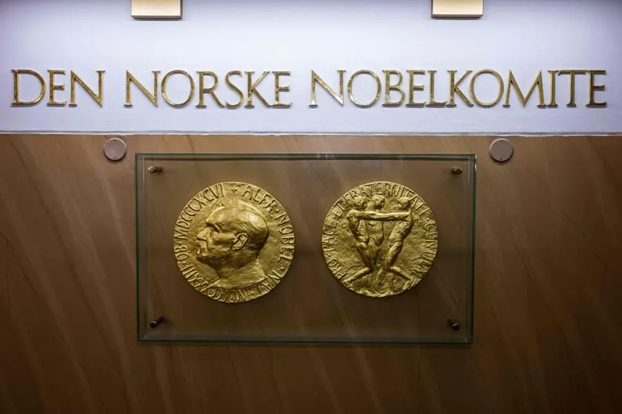 Could an AI scientist win a Nobel Prize?
