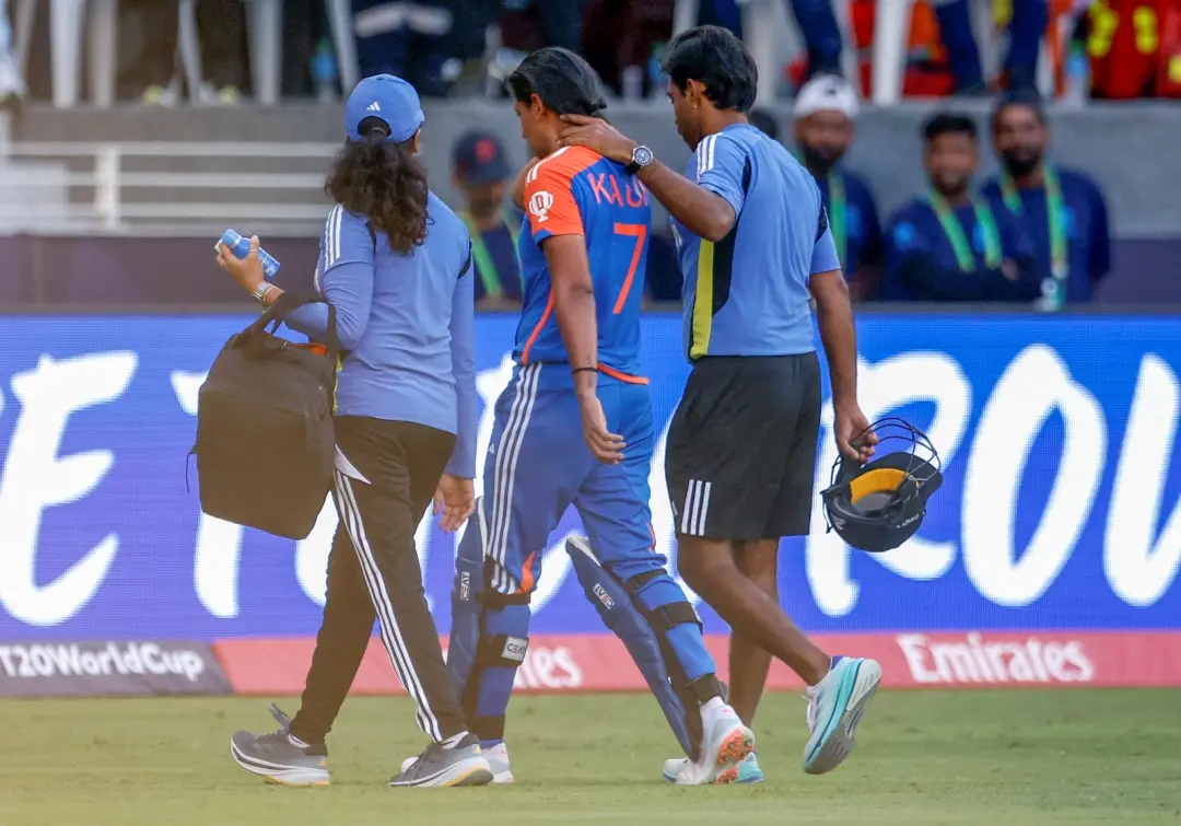 India's captain Harmanpreet Kaur walks back after she hurt herself while batting during the ICC Women's T20 World Cup match between India Women and Pakistan Women at the Dubai International Stadium, Dubai, on Sunday. | Photo: IANS