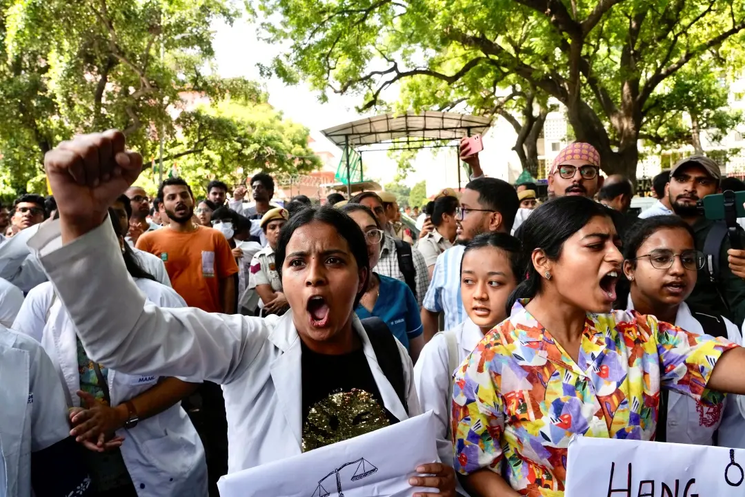 Doctors and paramedics protest against the rape and killing of a trainee doctor in Kolkata