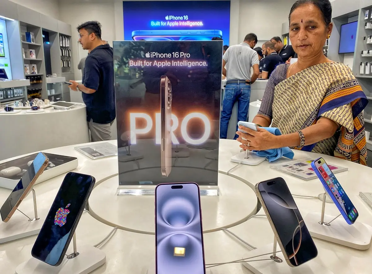Visitors at an Apple store looking at the iPhone 16 and 16 Pro series | Filephoto: PTI
