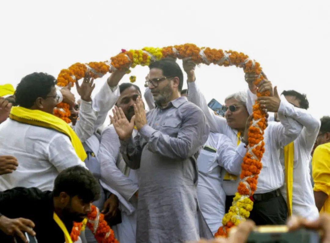 Jan Suraaj founder Prashant Kishor being garlanded by supporters during the formal launch of his new political party at Veterinary College grounds in Patna on Wednesday. | Photo: PTI