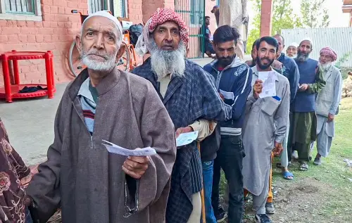 Voters wait in queues to cast their votes for the final phase of the Jammu and Kashmir Assembly elections, in Bandipora on Tuesday | Photo: ANI