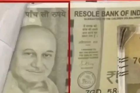 Anupam Kher surprised as his image appears on fake currency notes