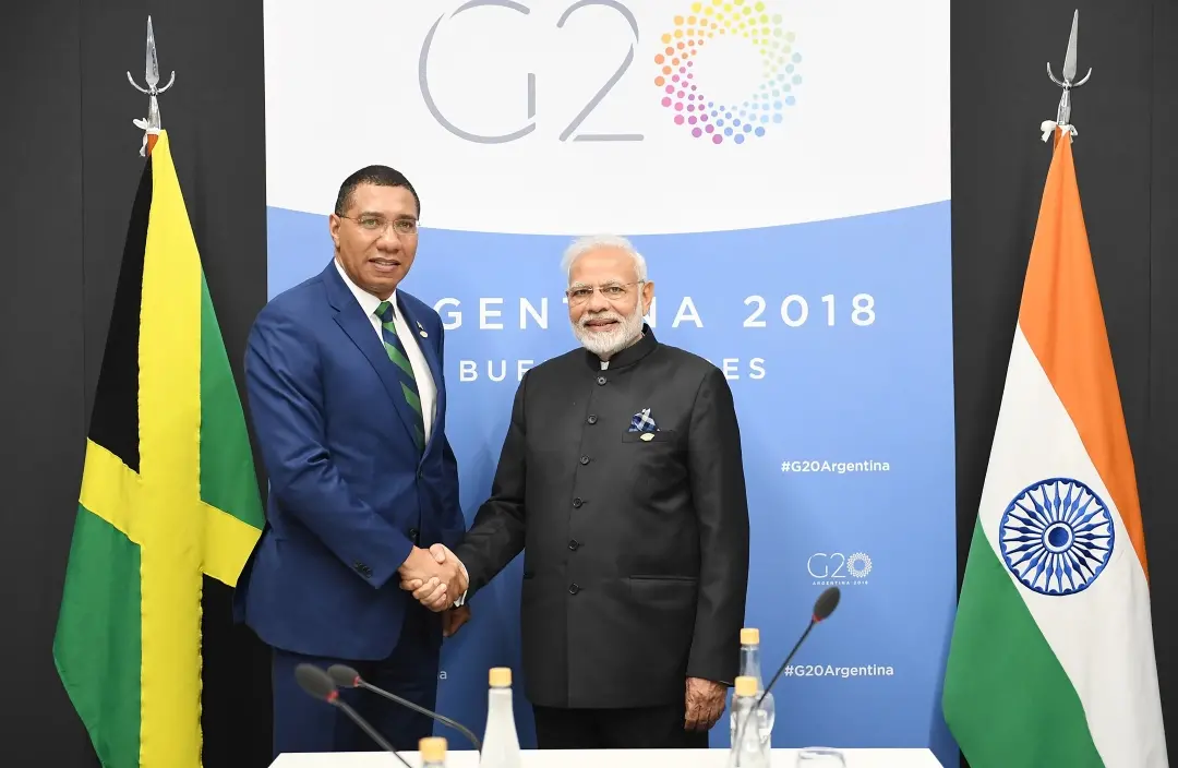 Narendra Modi (R) shaking hands with Andrew Holness during the G20 Summit in Buenos Aires | File Photo: AFP