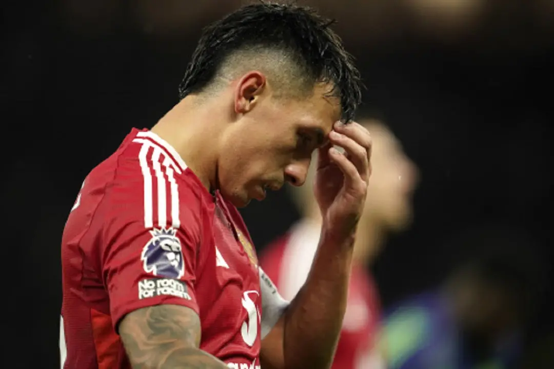 Manchester United's Lisandro Martinez reacts disappointed after the English Premier League soccer match between Manchester United and Tottenham Hotspur at Old Trafford stadium in Manchester, England, | Photo: AP
