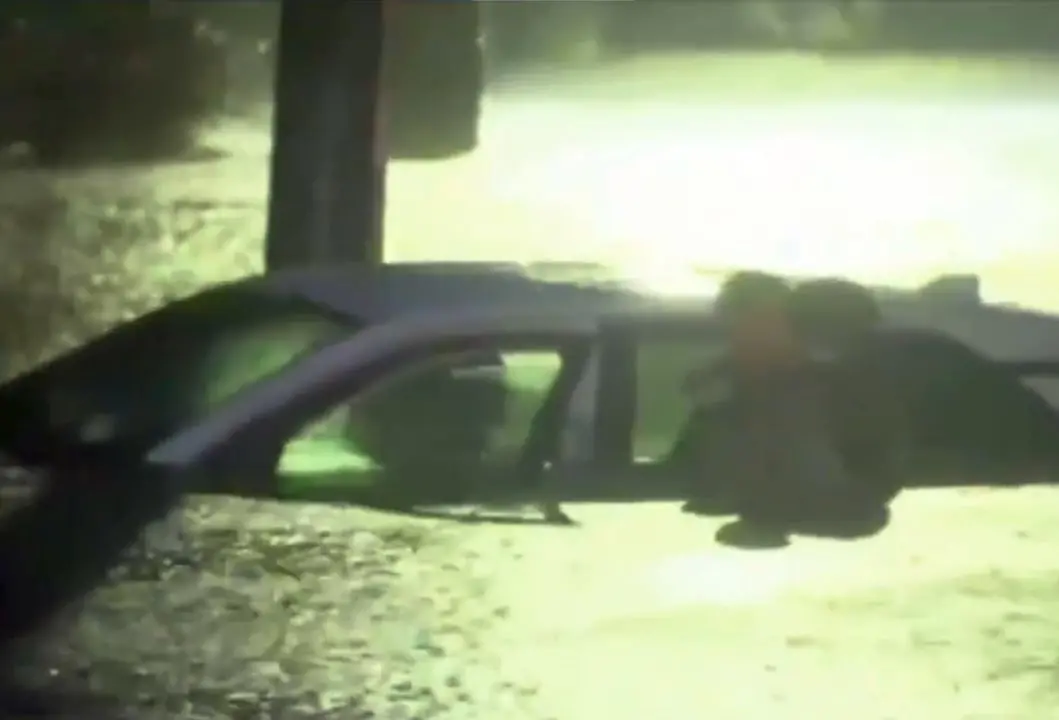 Van Dillen, a meteorologist for FOX Weather, rescues a woman who was stranded in her car