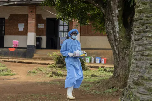 Health worker carries medication