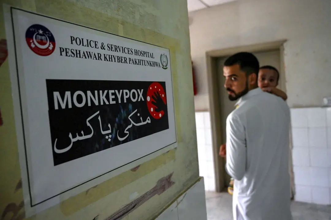 A poster indicating an isolation ward, prepared for mpox patients, is seen at the Police and Services hospital in Peshawar, Pakistan, where a case of mpox was announced last week | Photo: AFP
