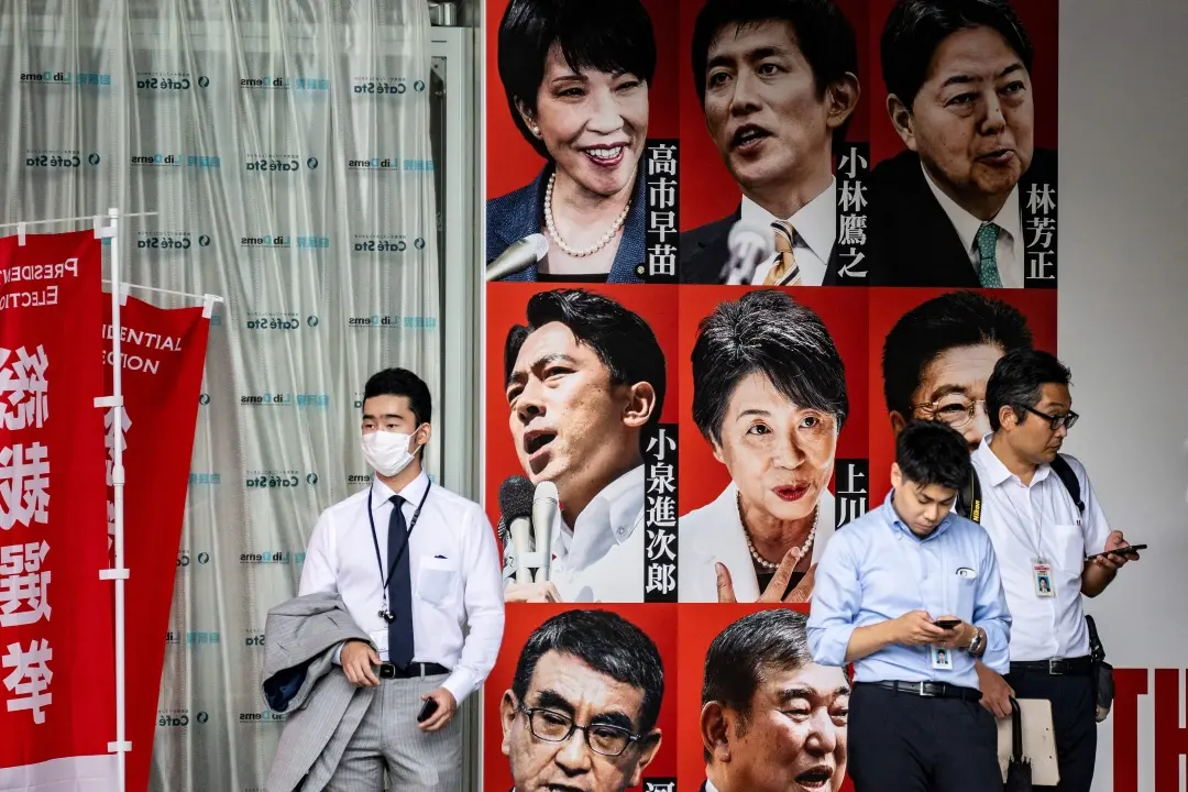 A poster showing the nine candidates for the Liberal Democratic Party's (LDP) leadership election, at the party's headquarters in Tokyo | Photo: AFP