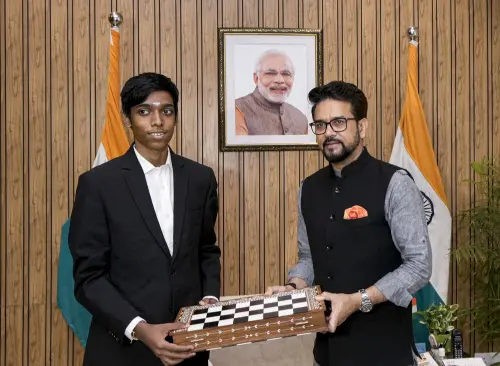 New Delhi: Union Minister of Youth Affairs and Sports Anurag Thakur felicitates FIDE World Cup 2023 runner-up Grandmaster R. Praggnanandhaa at his residence, in New Delhi, Thursday, Aug. 31, 2023. (PTI Photo/Kamal Kishore)