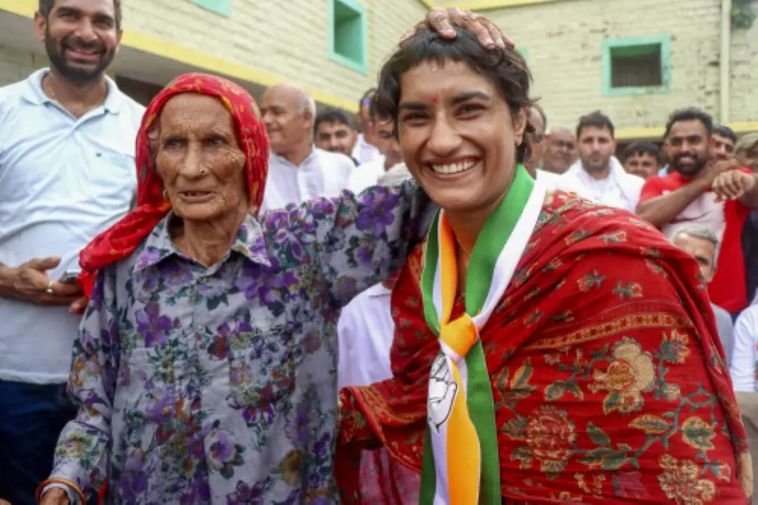 Congress candidate Vinesh Phogat campaigns for Assembly polls, in Jind, in Haryana. | Photo: PTI