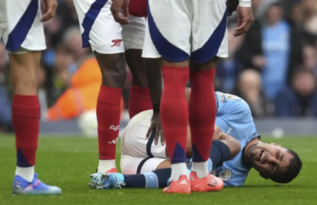 Manchester City's Rodri reacts to an injury, during the English Premier League soccer match between Manchester City and Arsenal at the Etihad stadium in Manchester on Sunday. | Photo: AP