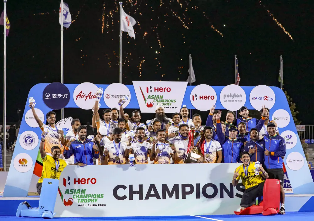 Indian Hockey team poses with the trophy after India won the Asian Champions Trophy 2024 final against China | PTI