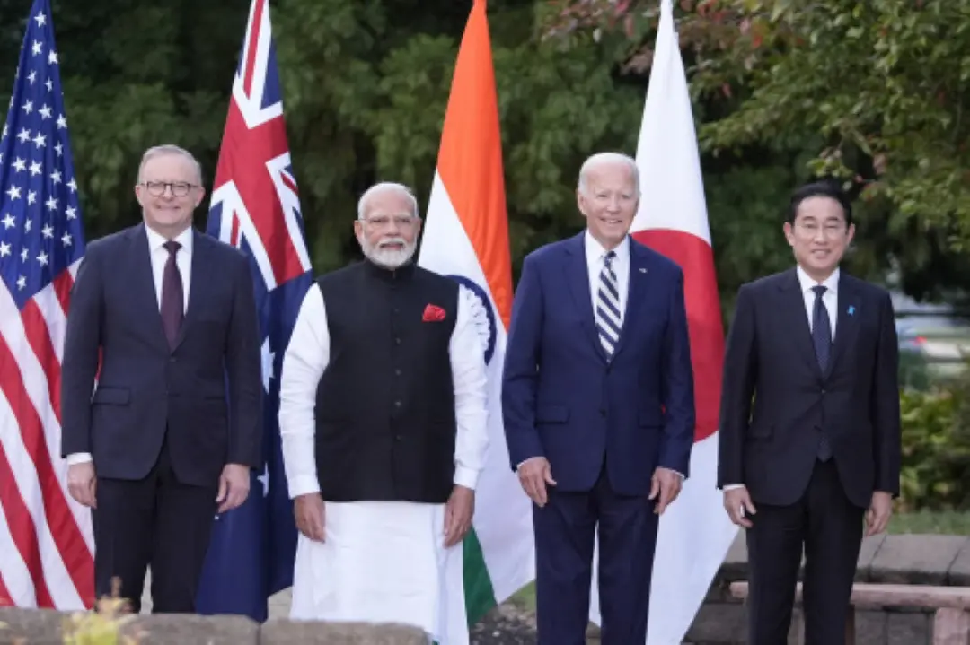 President Joe Biden, joined by Australia's Prime Minister Anthony Albanese, Japan's Prime Minister Fumio Kishida, and India's Prime Minister Narendra Modi, stand for a group photo before speaking about a Quadrilateral Cancer Moonshot initiative on the sidelines of the Quad leaders summit at Archmere Academy in Claymont, Del., on Saturday. | Photo: AP