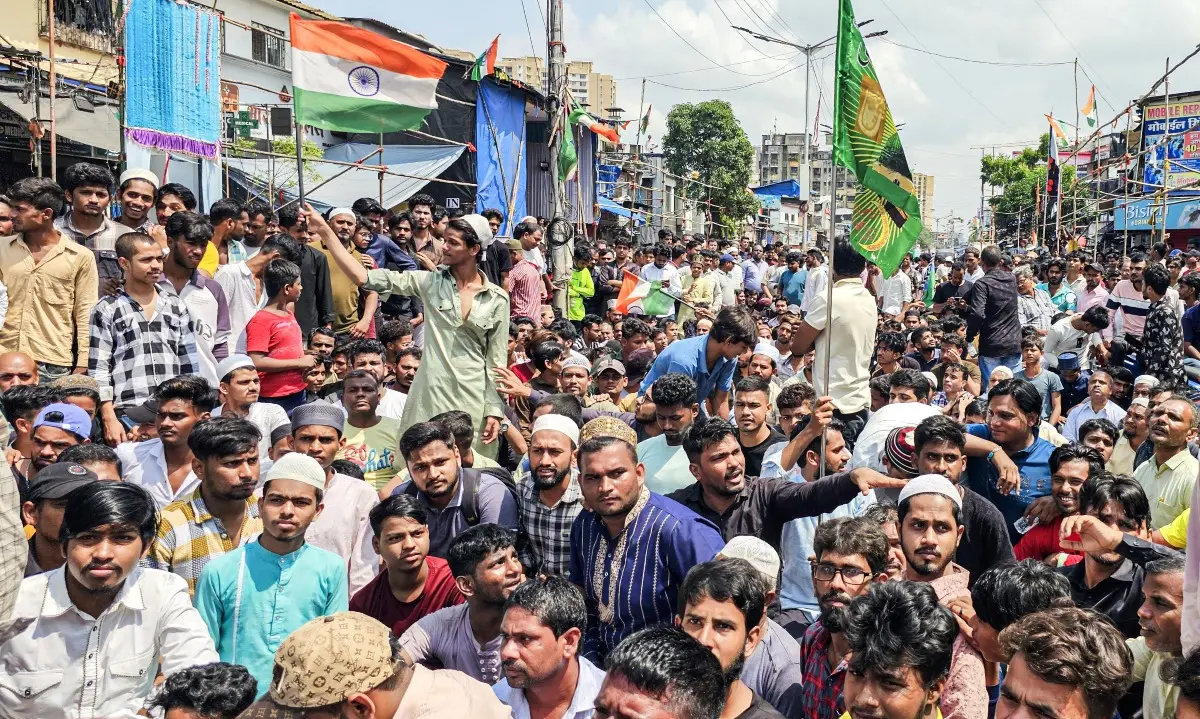 Locals protest BMC's drive to demolish an alleged illegal portion of a mosque | Photo: ANI