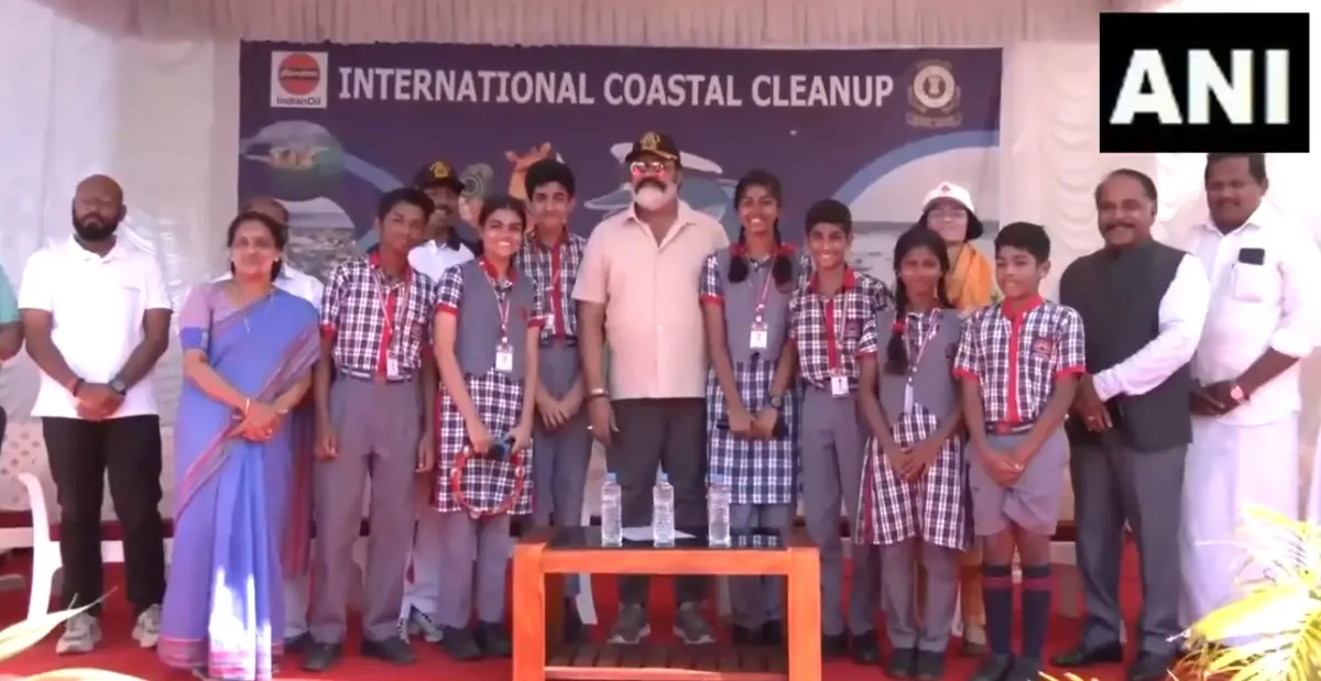 Suresh Gopi posing with volunteers at Shangumugham Beach as part of International Coastal Cleanup Day | Photo: Screengrab of X/ ANI