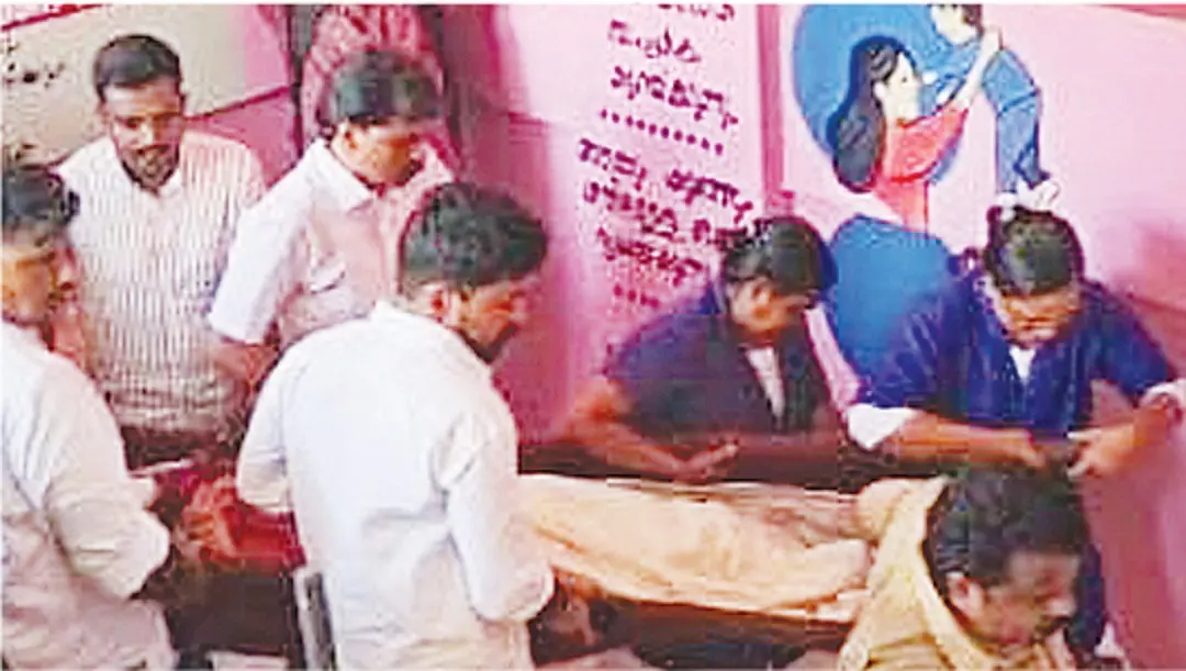 Patients moved in cloth stretcher