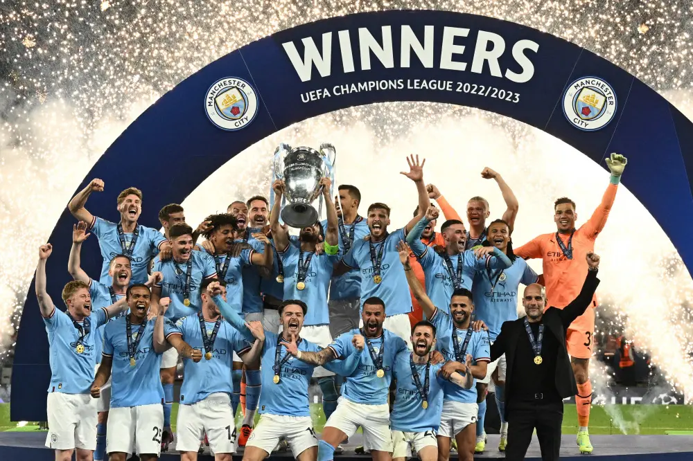 Manchester City Players celebrate with Champions League trophy (File pic)  | Photo:  AFP