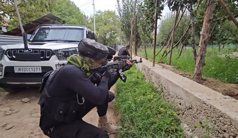 Security personnel during an encounter with militants at Chak Tapper Kreeri Pattan area in Baramulla district | PTI