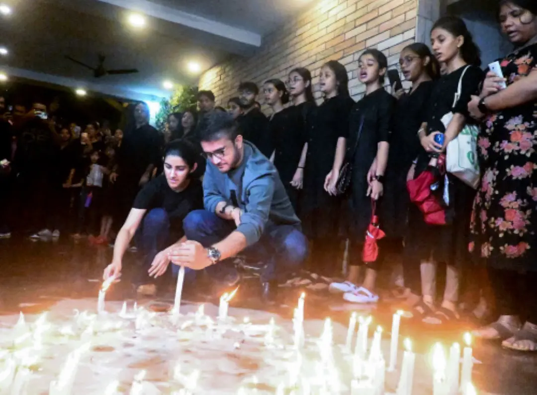 Former Indian Cricketer Sourav Ganguly along with his daughter Sana Ganguly light candles as part of their protest demanding justice for the alleged sexual assault and murder of a postgraduate trainee doctor of the RG Kar Hospital, in Kolkata in August. | File Photo: ANI