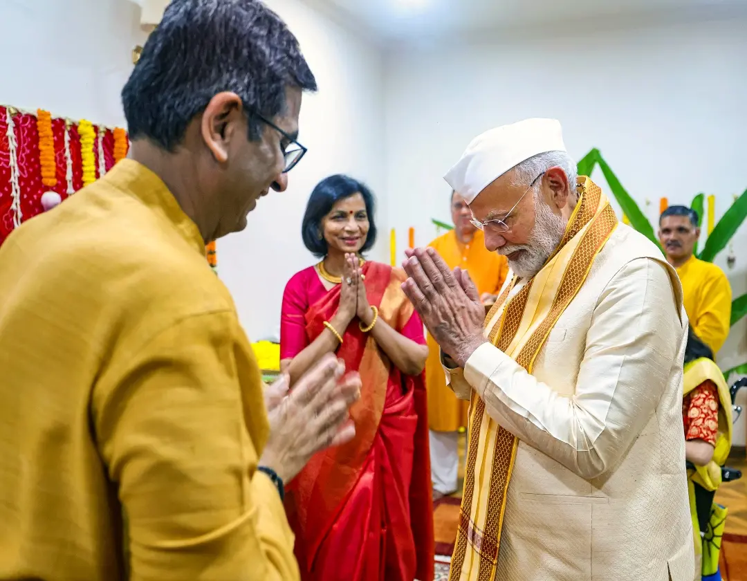 PM Narendra Modi exchanges greetings with CJI DY Chandrachud while attending 'Ganpati Puja' at the latter's residence