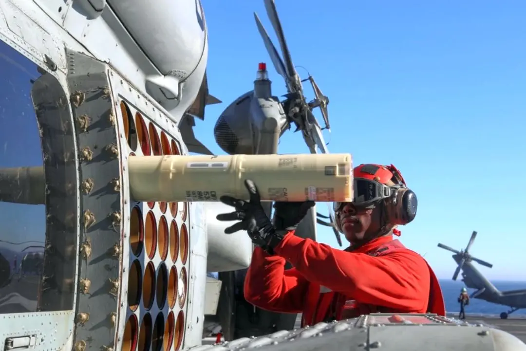 File photo of an anti-submarine warfare sonobuoy being loaded into a US Navy MH-60S Sea Hawk helicopter