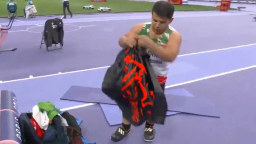 Iran's Sadegh Beit Sayah was disqualified for repeatedly displaying an objectionable flag following a dramatic men's javelin throw F41 final at the Paris Paralympics on Saturday. | Photo: Screengrab/X