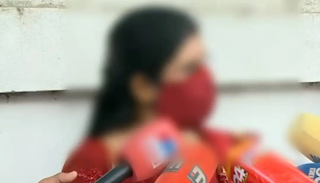 Woman upon arriving at the police headquarters to file complaint with DGP