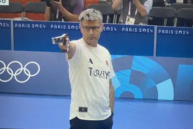 Turkish Olympic shooter Yusuf Dikec aims to trademark viral stance