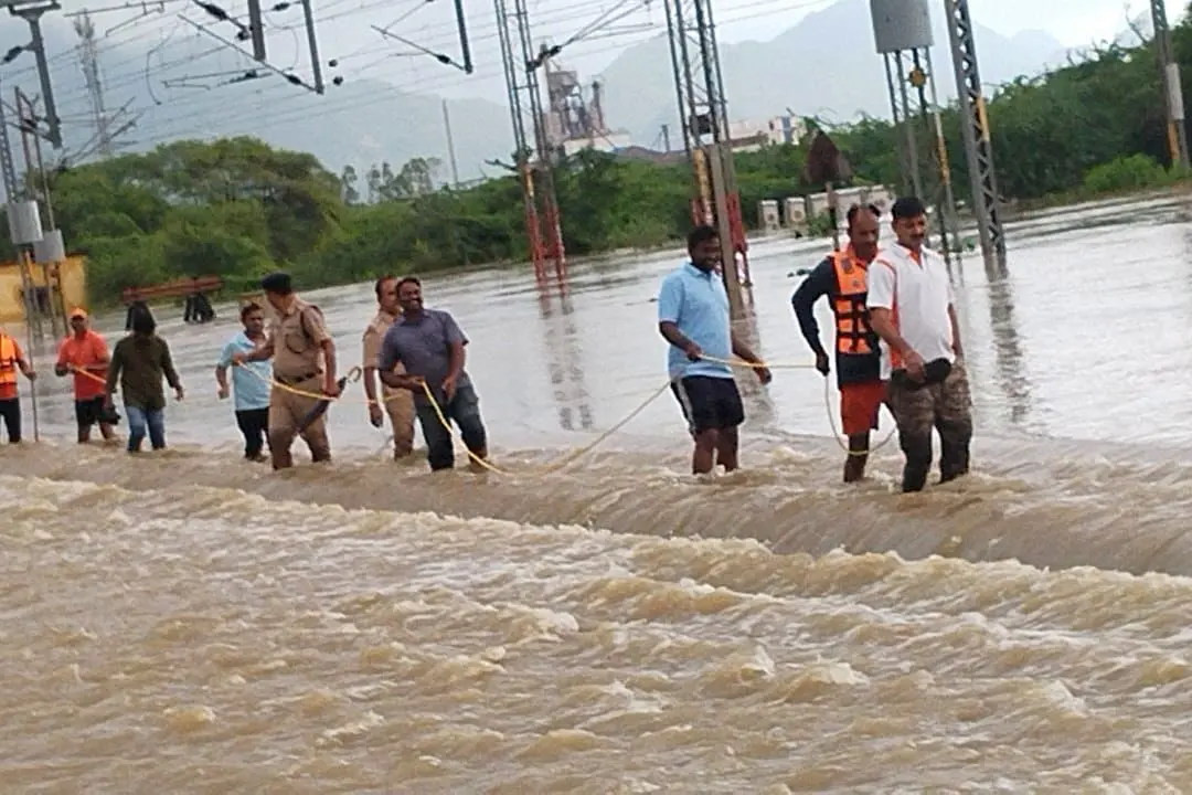 NTR district revenue administration officials make special arrangements for railway passengers following severe flooding, in NTR District on Sunday