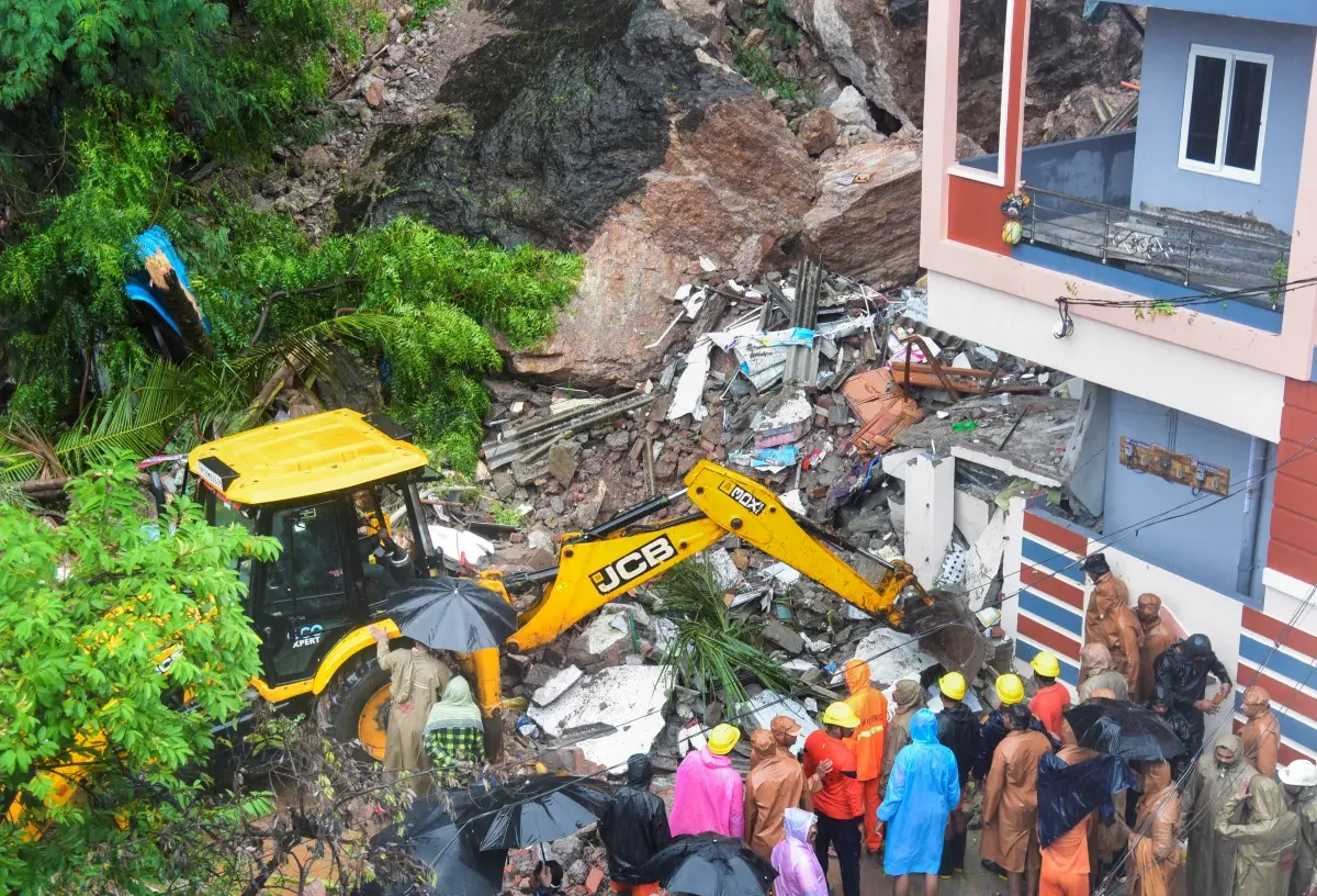Rescue work underway after a house collapsed due to heavy rainfall at Moghalrajpuram in Vijayawada | Photo: PTI