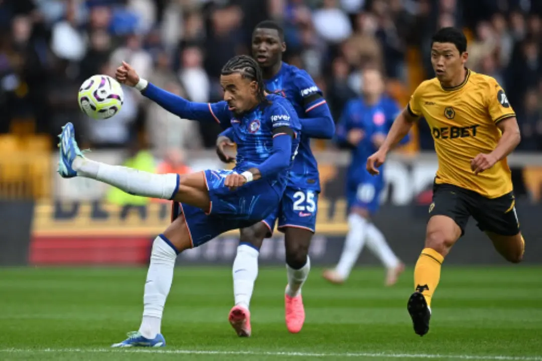 Chelsea's French defender #27 Malo Gusto clears the ball during the English Premier League football match between Wolverhampton Wanderers and Chelsea at the Molineux stadium in Wolverhampton, central England. | File Photo: AFP