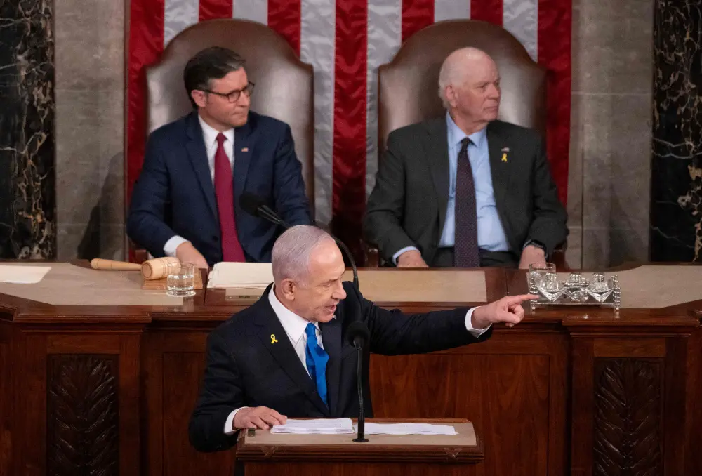 Israeli Prime Minister Benjamin Netanyahu acknowledges Israeli soldiers while addressing a joint meeting of Congress at the US Capitol | AFP