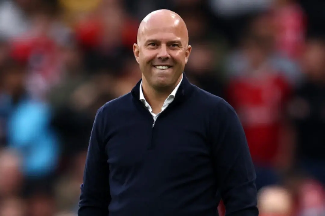 Liverpool's Dutch manager Arne Slot smiles on the touchline during the English Premier League football match between Liverpool and Brentford at Anfield in Liverpool, north west England. | File Photo: AFP