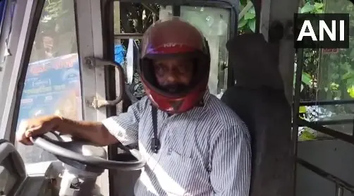 Bus drivers wearing helmets