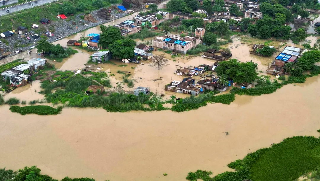 A view of an area flooded with the swollen Ganga river water after heavy rainfall, in Patna | File Photo: PTI