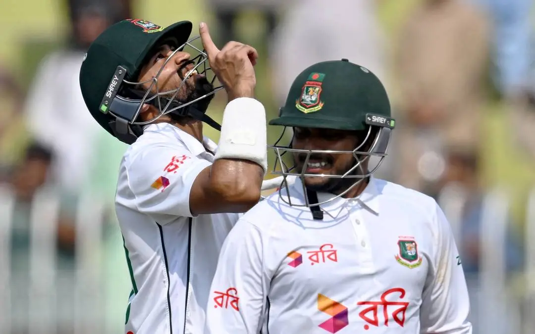 Bangladesh's Shadman Islam (L) and Zakir Hasan celebrate after their team's win during the fifth and final day of the first Test cricket match between Pakistan and Bangladesh | Photo: AFP