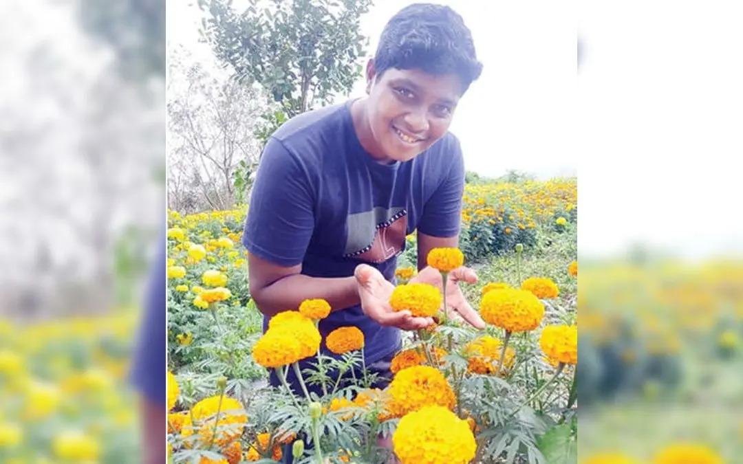 Rahul Raveendran in his marigold field | Photo: Mathrubhumi