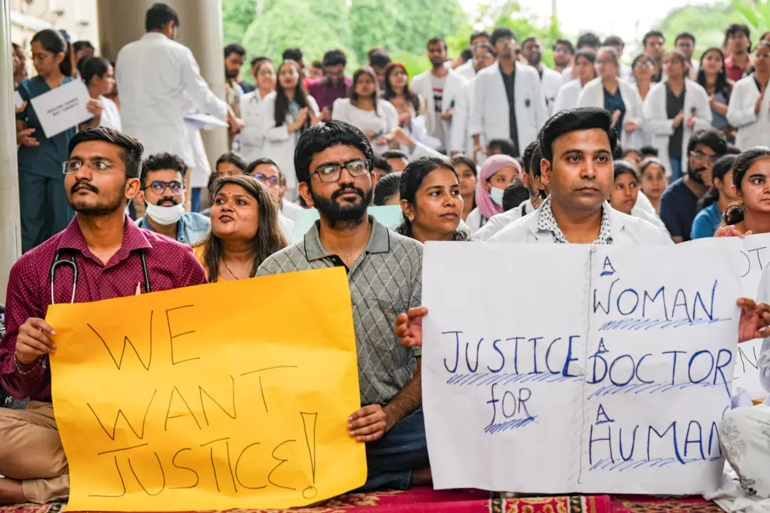 Medical students stage a protest against the sexual assault and murder of a postgraduate trainee doctor in Kolkata