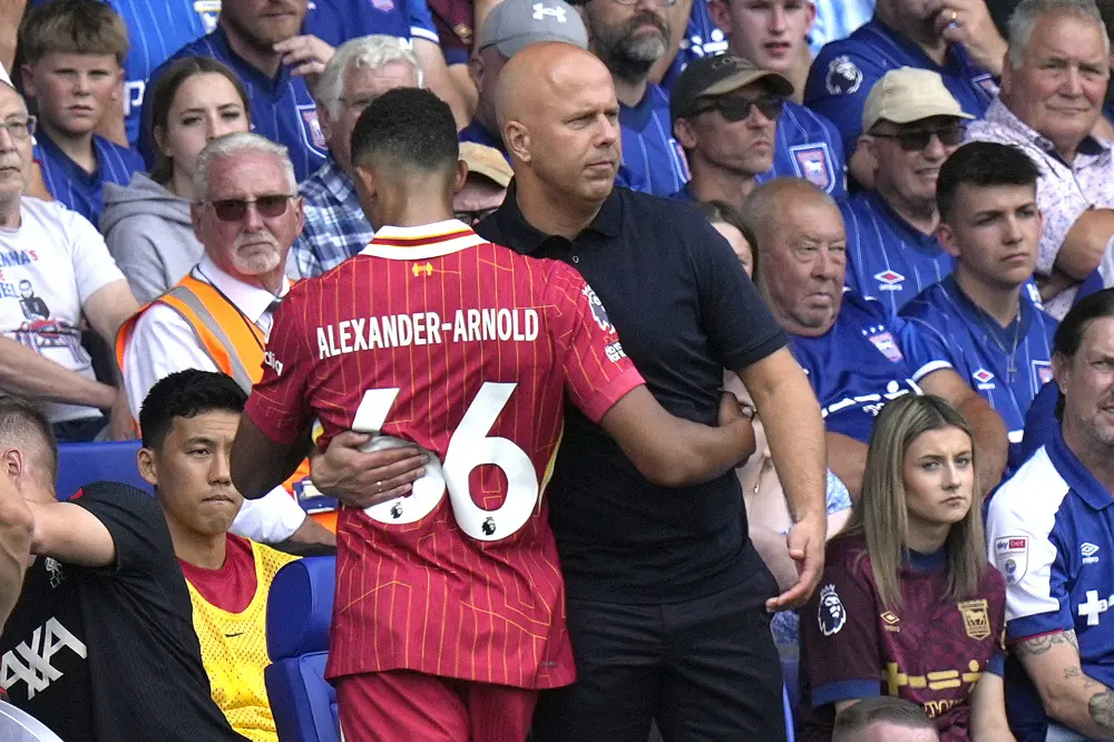 Arne Slot hugs Liverpool's Trent Alexander-Arnold during the match | AP