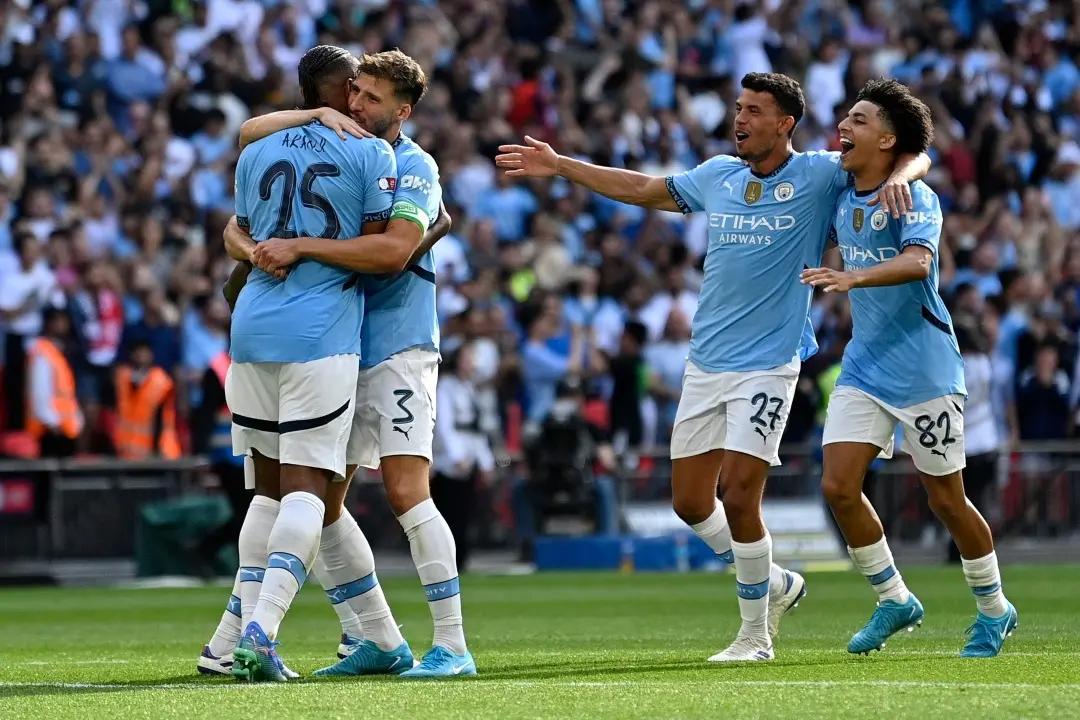 Elated Manchester City players. | File Photo: AFP