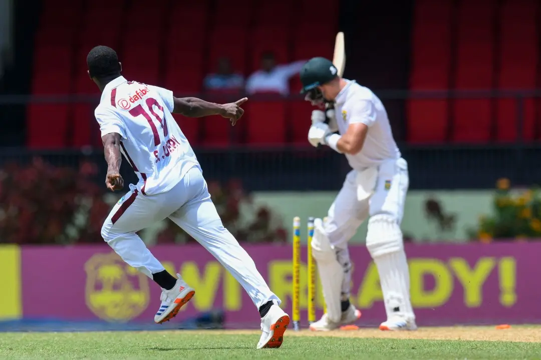 Aiden Markram (R) of South Africa is bowled by Shamar Joseph (L) of West Indies during Day 1 of the 2nd Test match between West Indies and South Africa at Guyana National Stadium in Providence, Guyana. | Photo: AFP