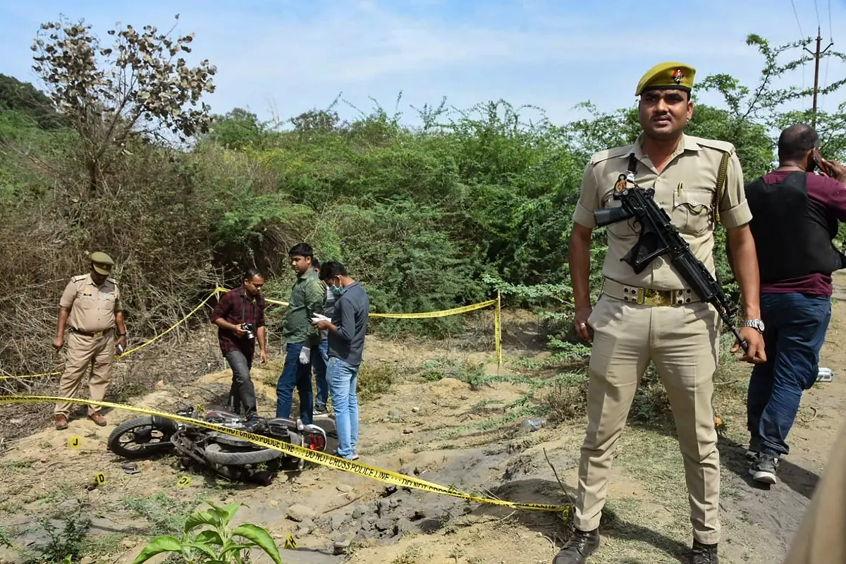 Police personnel at the site of the encounter in which jailed mafia Atiq Ahmad's son Asad was killed by the UP STF, in Jhansi | Photo: PTI