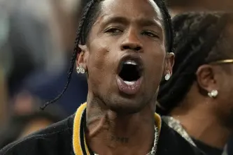 Rapper Travis Scott released from police custody, officer confirms 'no charges'