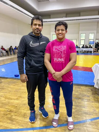 Reetika Hooda with her coach Mandeep | Photo: PTI