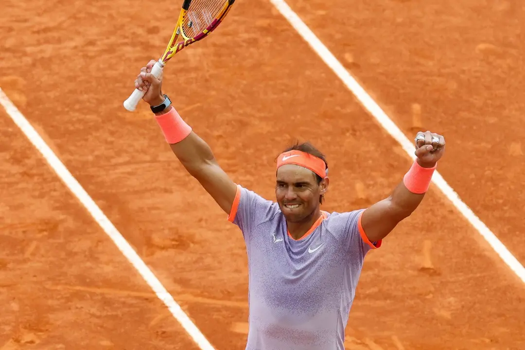 Rafael Nadal celebrates after winning against Argentina's Pedro Cachin during the third round of the 2024 ATP Tour Madrid Open | Photo: AFP